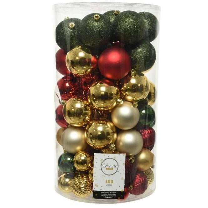 set of 100 baubles- red green and gold in a clear plastic tube container