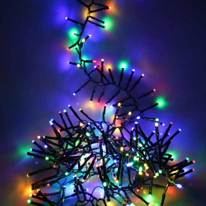 light set with the lights clumped into a pile lit and one strand pulled out to show them