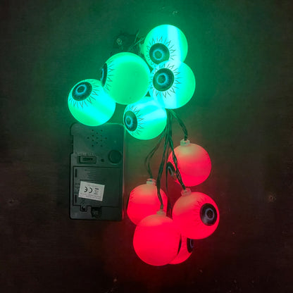 Red and green LED eye ball lights clumped together to show them with the battery box